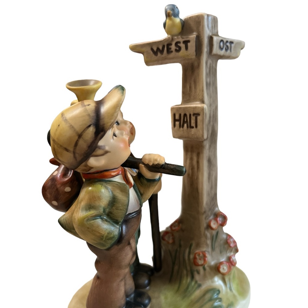 Rare Pre-owned Hummel figurine at 6 3/4”. “Crossroads “ #786 HUM 331.